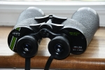 There are generally speaking two types of binocular, the roof prism type and the porro prism type. The roof type, look like a pair of straight telescopes strapped side by side, and the porro prism type have that familiar cranked look. As roof prisms are more difficult to make, they are therefore more expensive than porro. They are often made with smaller prisms and with a smaller field of view than similarly priced porro prism binoculars. I am suggesting that you may well get the same performance from porros that are half the price of the roof prism, but they are of course more bulky and heavier.I do have a Foton 5 x 25 Russian binocular with roof prisms and it is delightful. Strangely the objective lenses measure 30mm dia and the exit pupil is 5mm. The optic shows all the attributes of a very high quality binocular. The Swift Belmont deluxe 10 x 50, these are superb,lightweight underrated bins. My example is in cosmetically as new condition, optically too. They also have a very usable 7 degree field, which is great for a 10x50. Mine has trimmed down rubber eye cups which allow full access to this wide field.