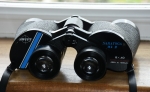 The angular diameter of the field stop, as it appears to the viewer’s eye, is called the apparent field of view of the eyepiece and may vary from 50 to 70degrees and over. The real field is the apparent field divided by the magnification. Binoculars are often described as wide field and extra wide field. I would say those with eyepieces with apparent fields of 70degrees or more are “extra wide field”, and those with an apparent field of 60 are wide field. With the real observable field being the apparent field divided by the magnification figure, it can be seen that the lower the power the wider will be the real field. For example a 6x power binocular will have twice the field of a 12x binocular, providing that they both have the same design type of eyepiece, with the same apparent field of view. Because their objective lenses are wider apart, porro prism binoculars of normal configuration give greater stereoscopy than roof prism binoculars. Swift Saratoga Mk2 8 x 40 Love this 1973 bin, nice wide 9.3 degree field. Same eyepieces and bars as my "gold stripe" 1981 Audubon. This one also has nicely done "diy trimmed down" rubber eyecups.