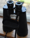 8. Actually using the binocularIf you try to look directly at the edges of the field of view, by rotating your eyes in their sockets they can move off the exit pupil introducing dark patches. If however you are observing with a 7 x 50 you do at least have a little space to move your typically daytime 3 to 4mm eye pupil, within the 7mm exit pupil of the binocular. We instinctively move the binocular to bring the prime target into the middle of the view. If we lock our eyes onto the centre of the field of view, we let or peripheral vision do what it’s best at i.e. spotting movement and detecting dim objects. The binoculars edge clarity is generally not too important as our peripheral vision definition is very poor. We are however very critical of definition on the centre of the view. If you have good bins’ do try and wear your specs if the eye relief allows, especially if you suffer from astigmatism, as I do. Fujinon 16 x 70, on a tripod these are great for astronomy and other long distance observing. Closest focus 100 feet.