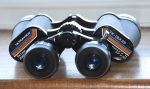 8x40, same magnification but the larger objective lens gives a little extra light grasp for those darker situations.10x50 the extra magnification with possibly a reduced field of view can make quick location of targets difficult in enclosed habitats. However, they really come into their own when used for longer distance viewing on open habitats such as farmland, reservoirs and estuaries. Always check the field of view and closest focus before making purchase, as this can be quite variable from type to type and from model to model. A word of WARNING here: When following the flight of birds in open countryside it is very easy to be unaware of them flying between you and the sun. If you happen to get even the briefest view of the sun through a binocular it could result in permanent blindness. Try always to keep the sun at your back. It’s better for viewing anyway. Ultraview 7 x 35 zoom, beautifully finished, narrow field of view but excellent sharpness and contrast.