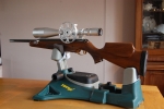My super 177 Air Arm's Prosport with a FalconT50LM (S) ( S for Silver), An excellent 60mm OG scope, even the moon looks good through it on 30x Note the 1inch thick sponge under the stock, just in front of the C of G. This seems to do a perfect job of absorbing the "springer shock."I lift the rear of the stock clear of the rear support with my left hand when aiming and taking the shot. Click image during "slideshow" for full size view. All the air rifles on these pages are sub 12 ft lbs requiring no licence in England.. DSC_0122 inside SF.jpg